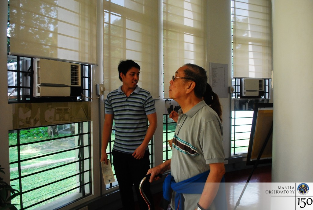Fr. Cuerquis at the part of the tour inside the solar building | Photo by Mariel Templanza